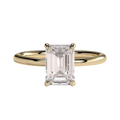 Luxury emerald claw solitaire engagement ring featuring a brilliant emerald-cut center stone secured in a refined claw setting with a sparkling hidden halo beneath the center stone. Elegant timeless design crafted for exceptional brilliance and sophistication, available in white gold, yellow gold, rose gold, platinum, lab-grown diamond, or moissanite options.
