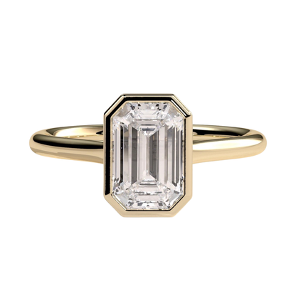 Luxury emerald bezel solitaire engagement ring featuring a brilliant emerald-cut center stone in a sleek bezel setting with an elegant cathedral high profile. Modern timeless design crafted for sophistication, durability, and everyday elegance, available in white gold, yellow gold, rose gold, platinum, lab-grown diamond, or moissanite options.