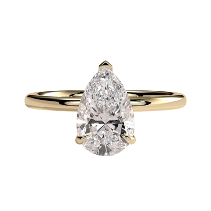 Luxury pear claw solitaire engagement ring featuring a brilliant pear-cut center stone secured in a refined claw setting for maximum sparkle and elegance. Timeless minimalist design crafted for everyday sophistication, available in white gold, yellow gold, rose gold, platinum, lab-grown diamond, or moissanite options.