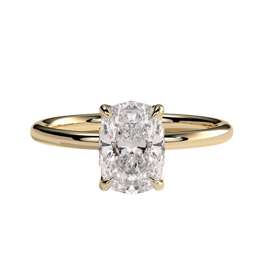 Luxury elongated cushion cut engagement ring featuring a brilliant claw-set solitaire center stone with an elegant petal gallery and delicate leaf accent details. Crafted in white gold with a nature-inspired design, available in lab-grown diamond or moissanite options for timeless elegance and everyday luxury.
