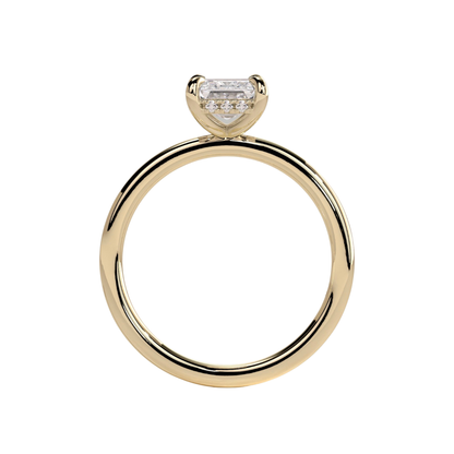 Luxury emerald claw solitaire engagement ring featuring a brilliant emerald-cut center stone secured in a refined claw setting with a sparkling hidden halo beneath the center stone. Elegant timeless design crafted for exceptional brilliance and sophistication, available in white gold, yellow gold, rose gold, platinum, lab-grown diamond, or moissanite options.