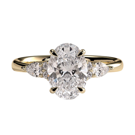 Luxury oval claw solitaire engagement ring featuring a brilliant oval-cut center stone with elegant pear-shaped accent diamonds and sparkling round shoulder stones. Crafted with timeless detail and refined brilliance, available in white gold, yellow gold, rose gold, platinum, lab-grown diamond, or moissanite options.