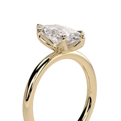Luxury marquise claw solitaire engagement ring featuring a brilliant marquise-cut center stone secured in a refined claw setting with an elegant petal gallery beneath the stone. Nature-inspired design crafted for timeless sophistication, exceptional brilliance, and lasting durability, available in white gold, yellow gold, rose gold, platinum, lab-grown diamond, or moissanite options.