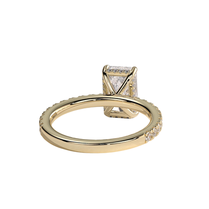 Luxury radiant claw solitaire engagement ring featuring a brilliant radiant-cut center stone secured in a refined claw setting with a sparkling hidden halo and pavé diamond band. Elegant timeless design crafted for exceptional brilliance, sophistication, and lasting beauty, available in white gold, yellow gold, rose gold, platinum, lab-grown diamond, or moissanite options.