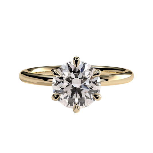 Round claw solitaire engagement ring featuring a brilliant round-cut center stone secured in a classic claw setting with a refined, elevated profile. Timeless and elegant design crafted to maximize sparkle and brilliance, available in white gold, yellow gold, rose gold, platinum, lab-grown diamond, or moissanite options.
